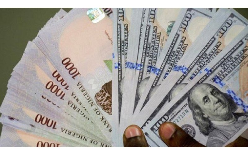 Naira Steadies as Reserves Hit Four-Year High; U.S. Dollar Holds Gains Amid Fed Tensions