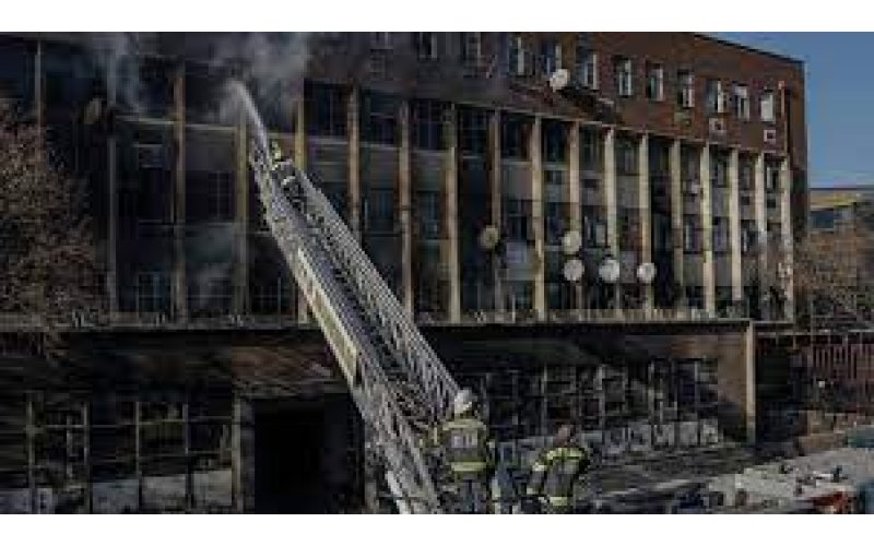 MAN ARRESTED FOR MURDER IN SOUTH AFRICA BUILDING FIRE.