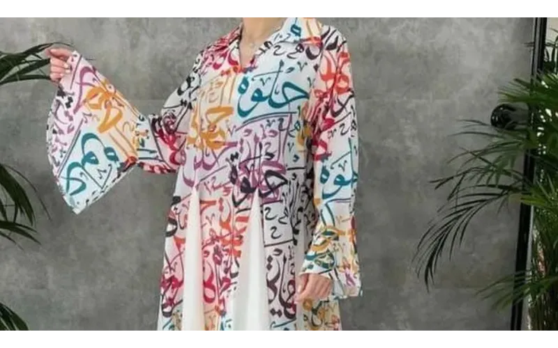 Pakistan woman in Arabic script dress saved from mob claiming blasphemy