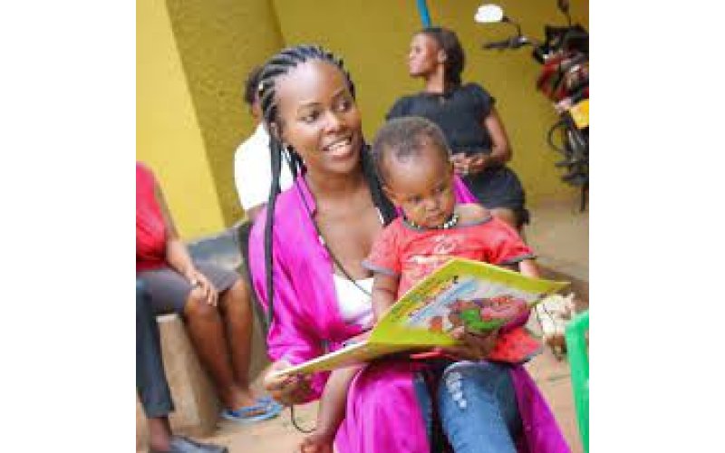 Uganda: The literacy specialist getting children to read and write.