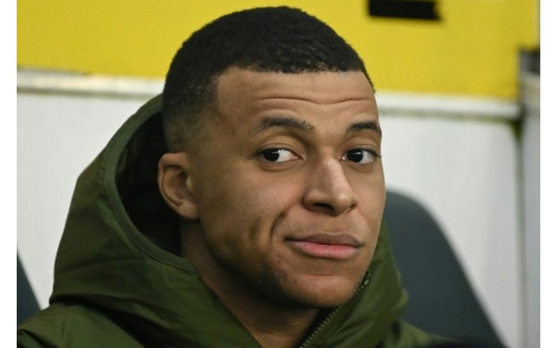 Which number would Mbappe wear at Madrid?