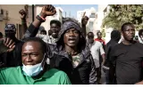 Senegal’s president backtracks on elections delay after top court rejects attempt.